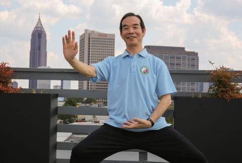 Paul Lam holding a tai chi pose