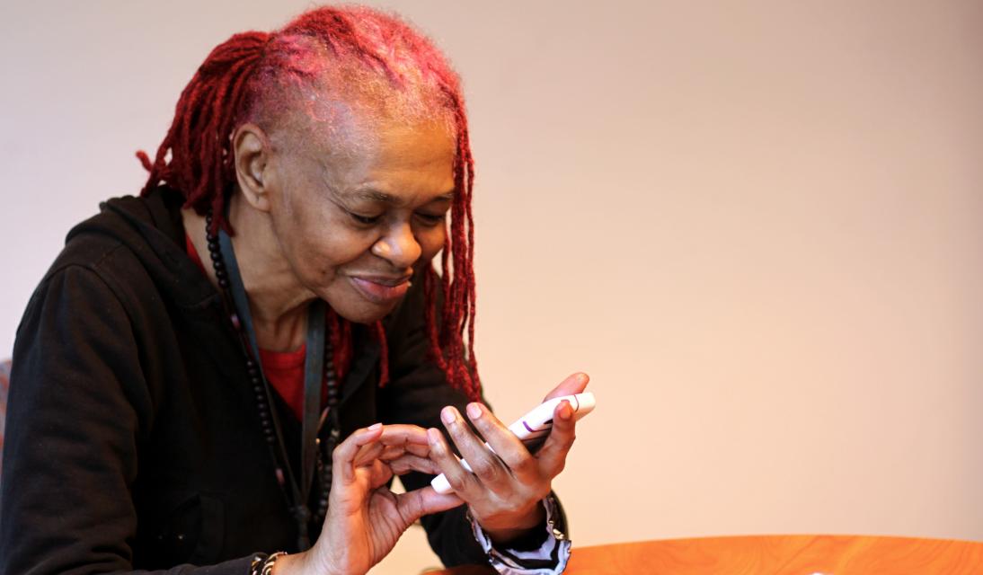 an older woman using a smart phone.